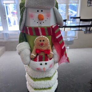 Snowman wine carrying container.